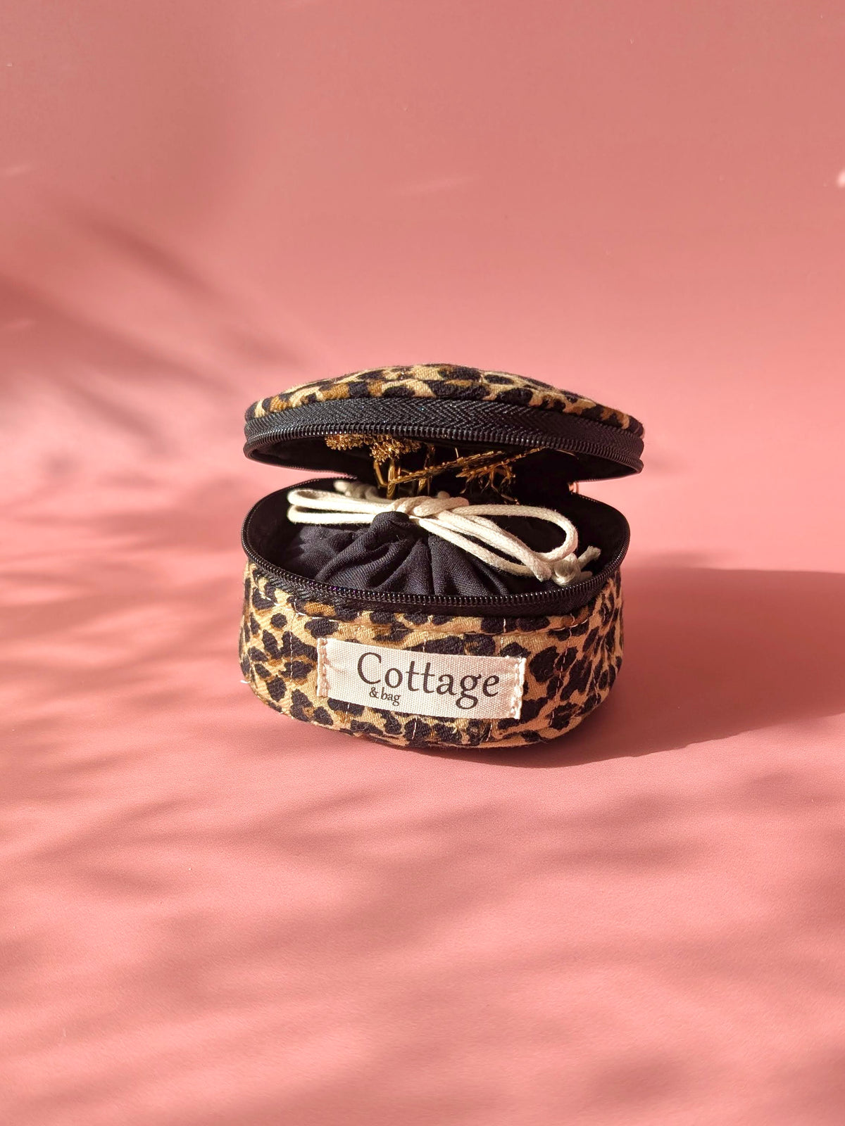 Écrin à bijoux rond de voyage