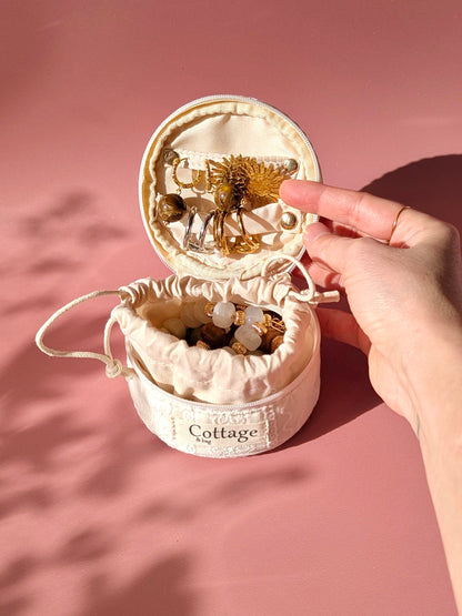 Écrin à bijoux rond de voyage