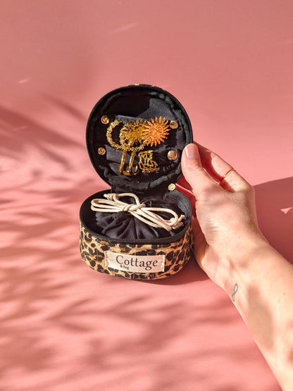 Écrin à bijoux rond de voyage